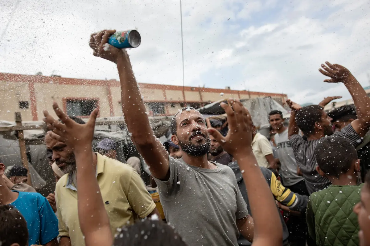 Celebrações em Khan Younis, no Sul da Faixa de Gaza, após anúncio de acordo