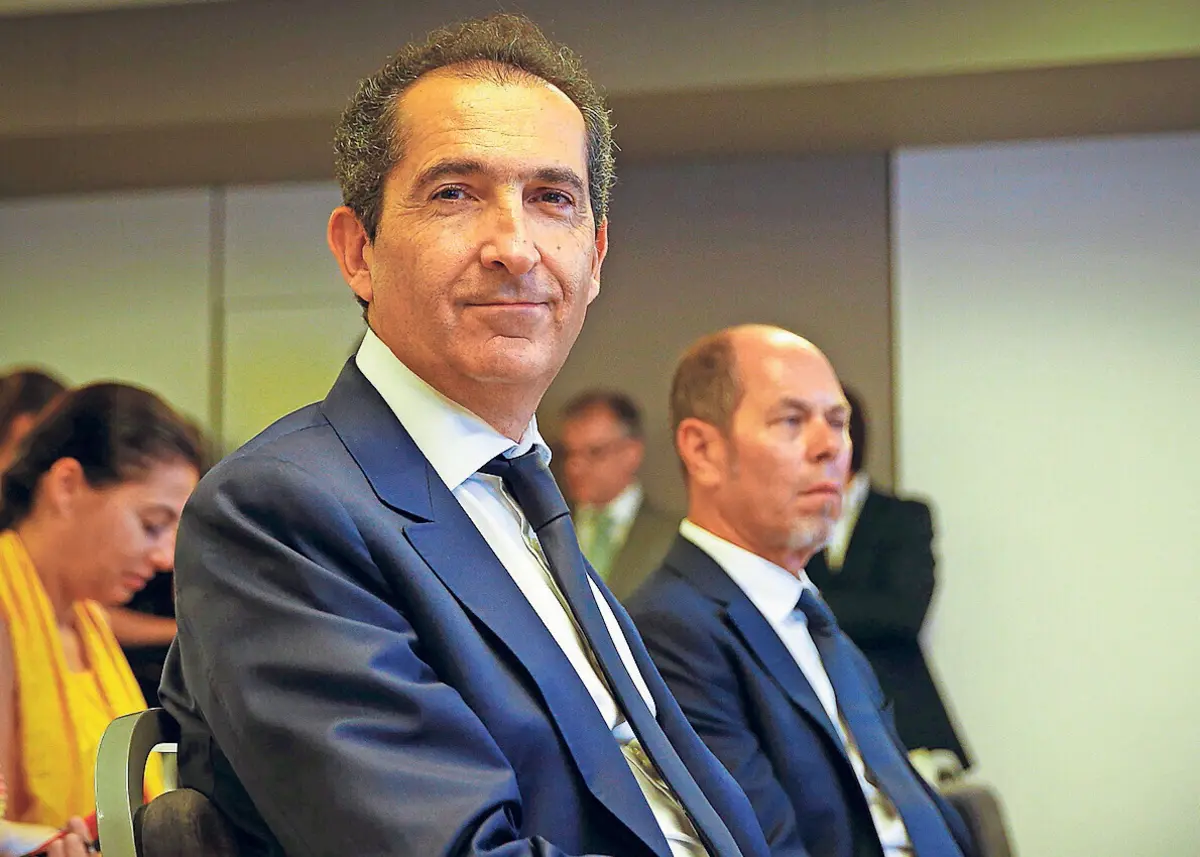 Patrick Drahi e Armando Pereira (em segundo plano
