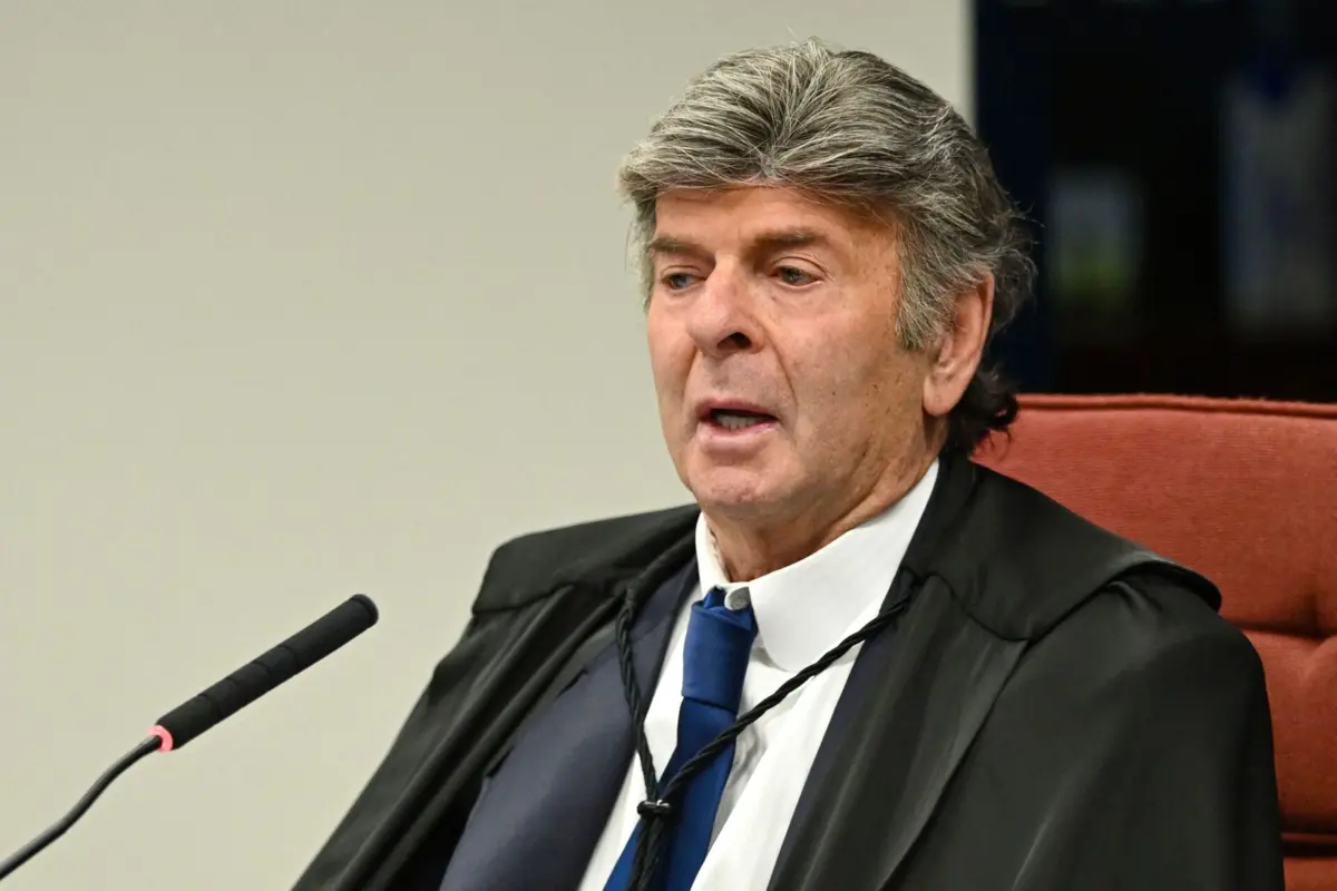 Brazil's Federal Supreme Court (STF) minister Luiz Fux speaks during the voting session to convict or acquit far-right former president Jair Bolsonaro (2019-2022) in a coup trial at the Federal Supreme Court in Brasilia on September 10, 2025. Two judges in Brazilian ex-president Jair Bolsonaro's coup trial voted on September 9 to convict him, with three others yet to give their verdicts in a case that has angered the right-winger's US ally Donald Trump. (Photo by Evaristo Sa / AFP)