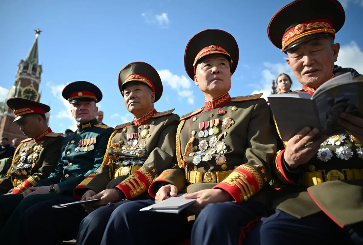 Oficiais norte-coreanos presentes na cerimónia