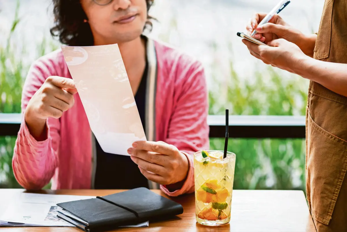 Man ordering food at the restaurant