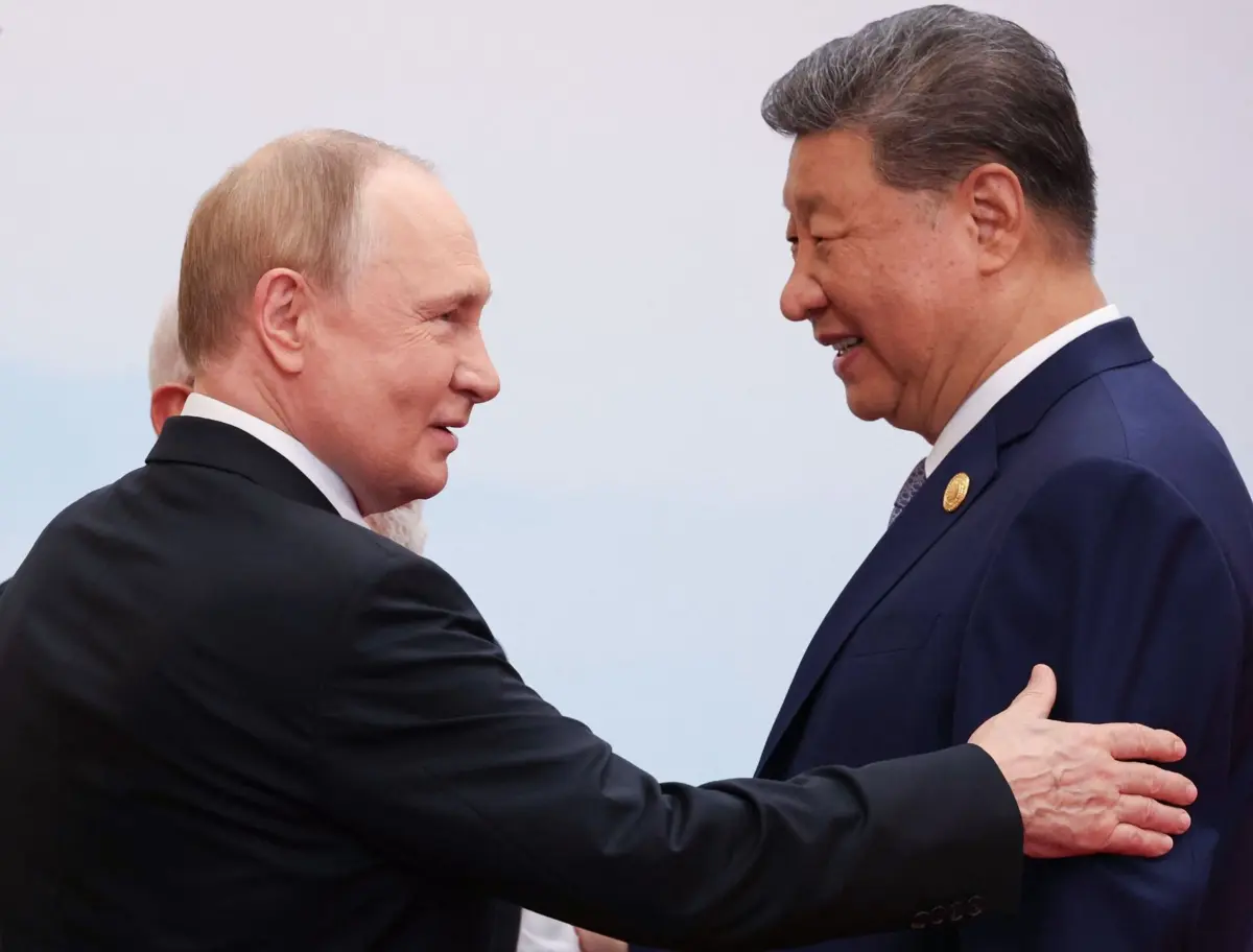O presidente russo Vlamidir Putin com o líder chinês Xi Jinping