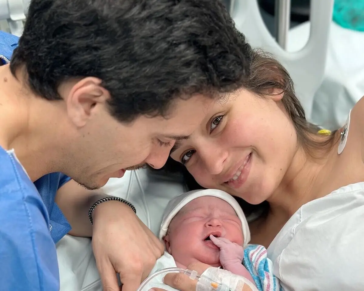 Miguel Coimbra e Angie Costa com a filha Alice