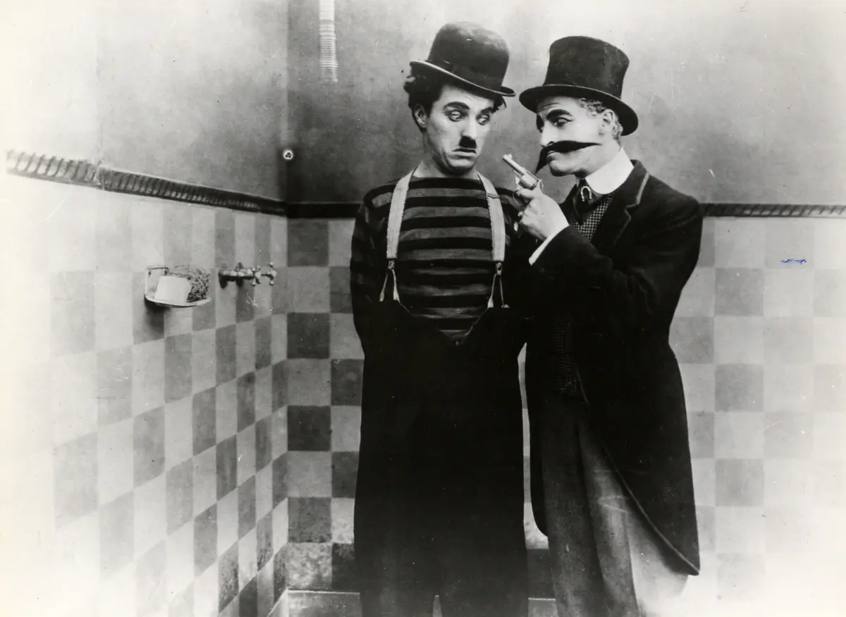 Charlie Chaplin em "Charlot, o evadido"