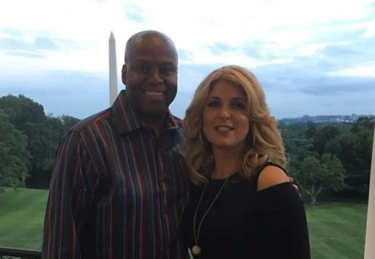 Craig Robinson, irmão de Michelle Obama, e a mulher Kelly