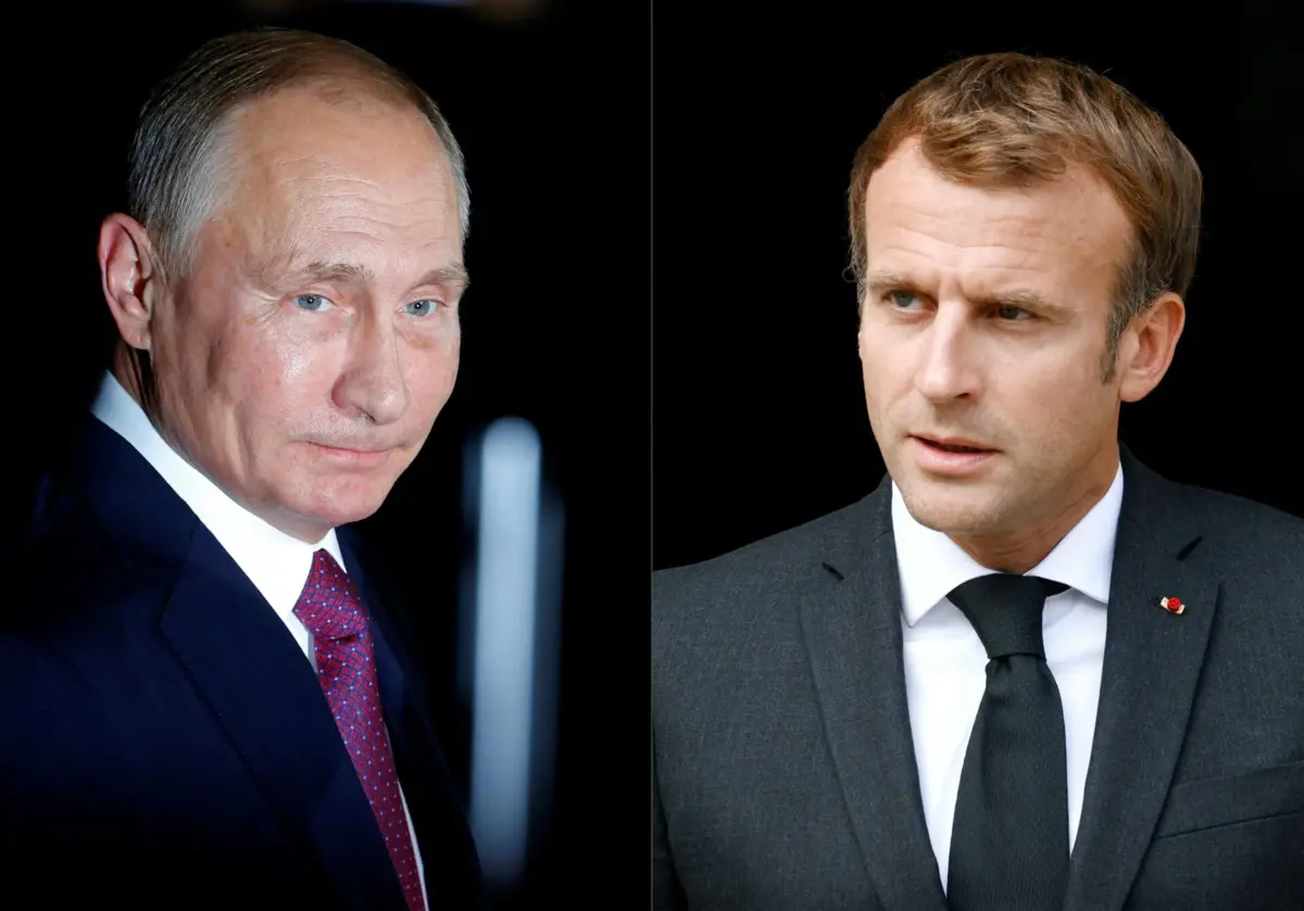 O presidente da Rússia, Vladimir Putin (esquerda), e o homólogo francês, Emmanuel Macron (direita)