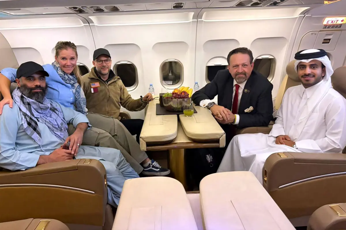 Amir Amiri (à esquerda). Catar foi mediador nas negociações