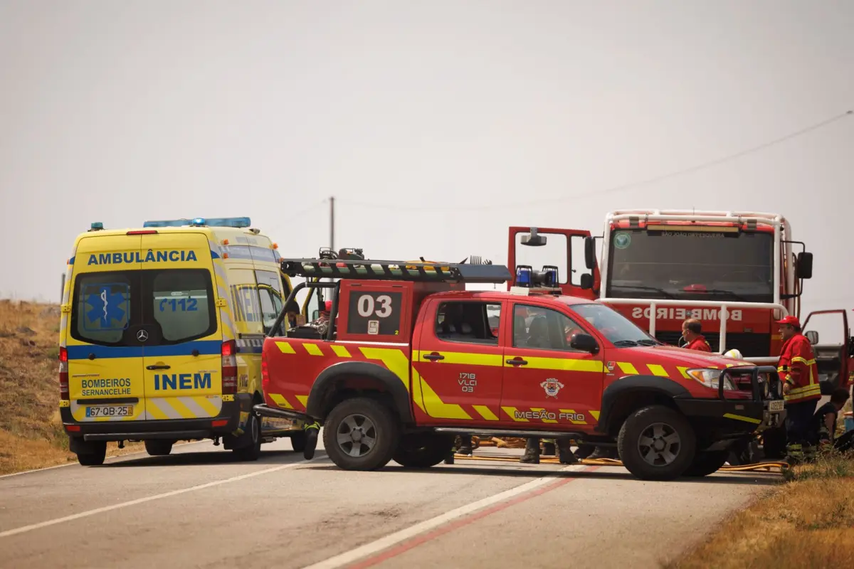 Firefighters receive assistance after being injured during a forest fire battle in Granjal, Sernancelhe, Viseu, Portugal, 14 August 2025. The fire that started early Wednesday morning in Satao, in the district of Viseu, spread to the districts of Sernancelhe (Viseu) and Aguiar da Beira (Guarda) and, in the late afternoon, was still raging with no possibility of direct combat, according to the commander on the ground. PEDRO SARMENTO COSTA/LUSA