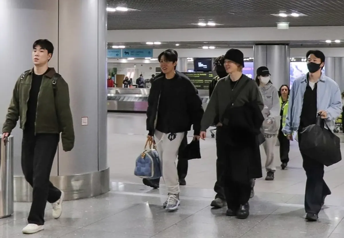 BTS à chegada no Aeroporto de Lisboa, numa visita inesperada que surpreendeu os fãs portugueses