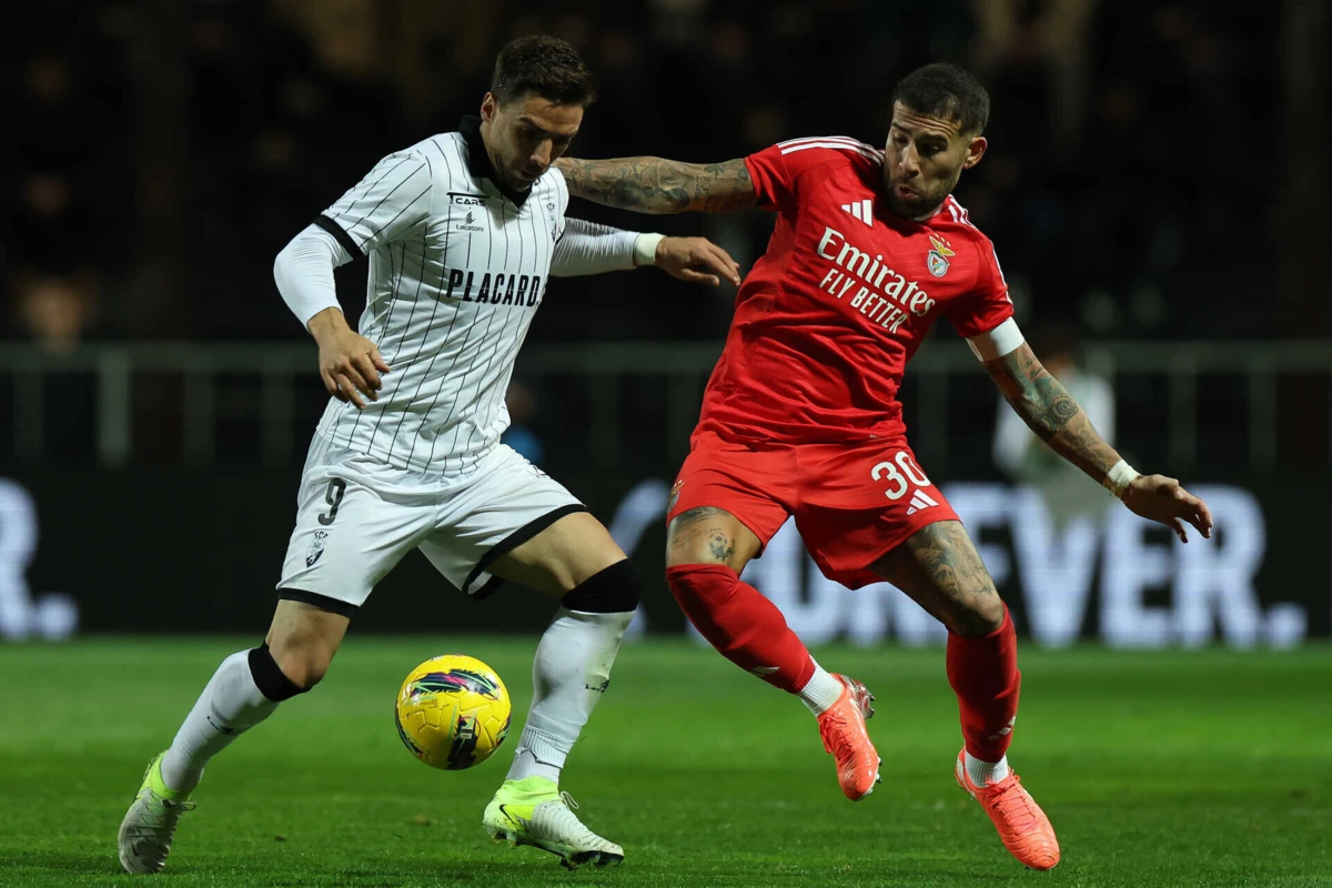 Tomané e Otamendi (Créditos: LUSA)