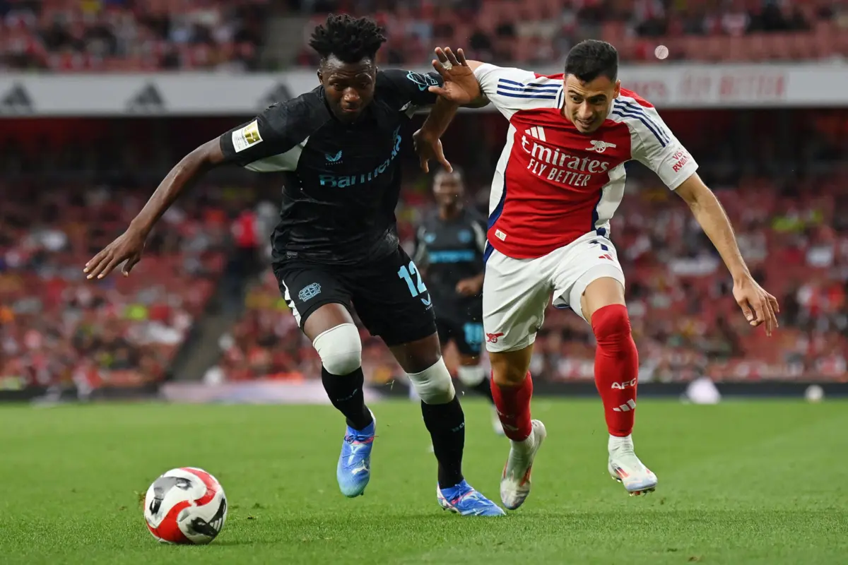 Tapsoba e Martinelli (Glyn KIRK AFP)