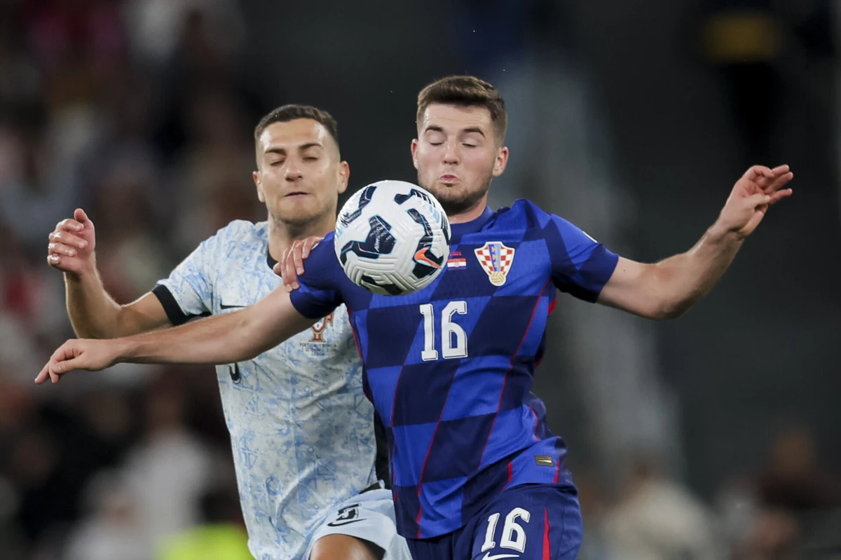 Martin Baturina e Diogo Dalot (Gerardo Santos)