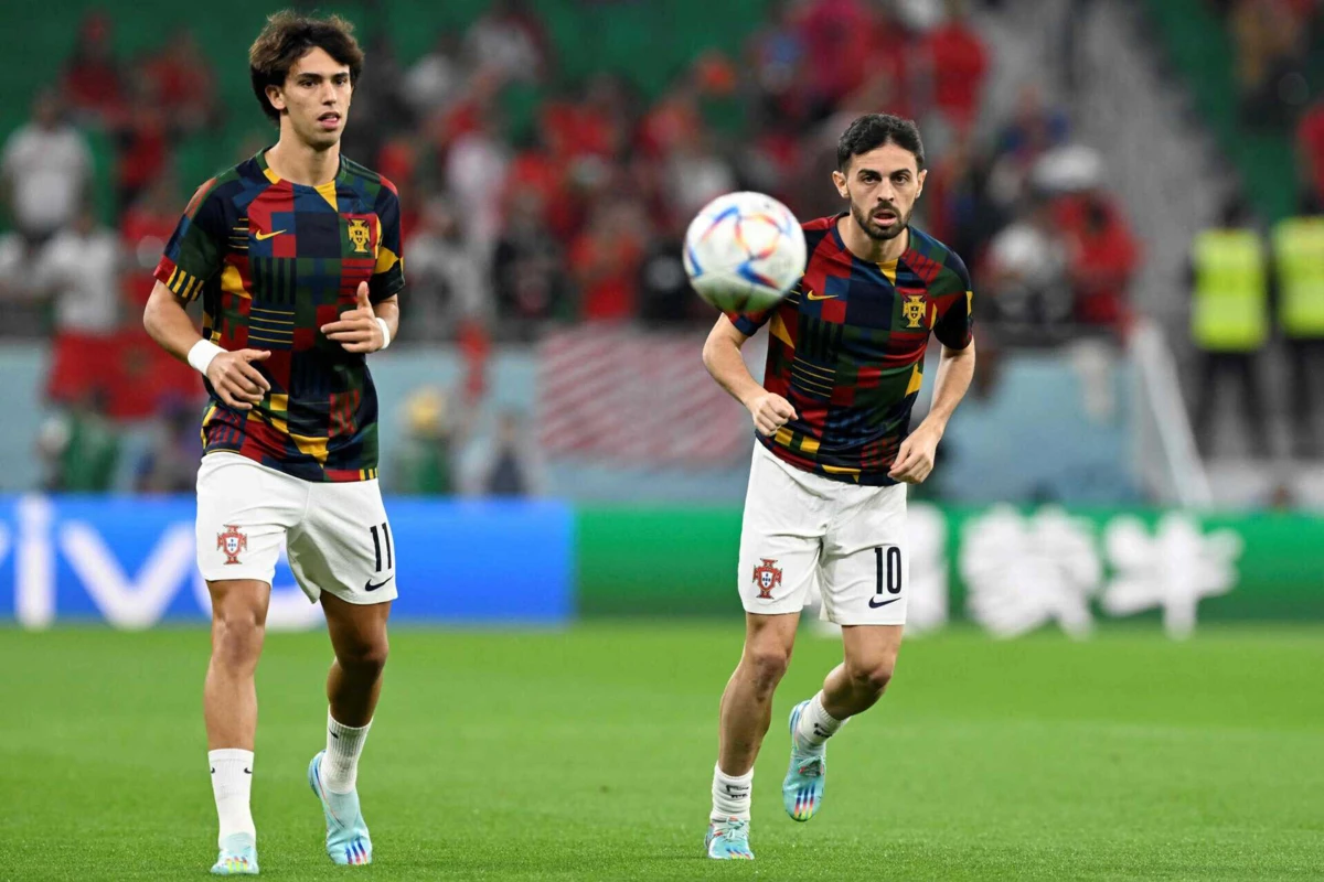 João Félix e Bernardo Silva (Créditos: PATRICIA DE MELO MOREIRA / AFP)