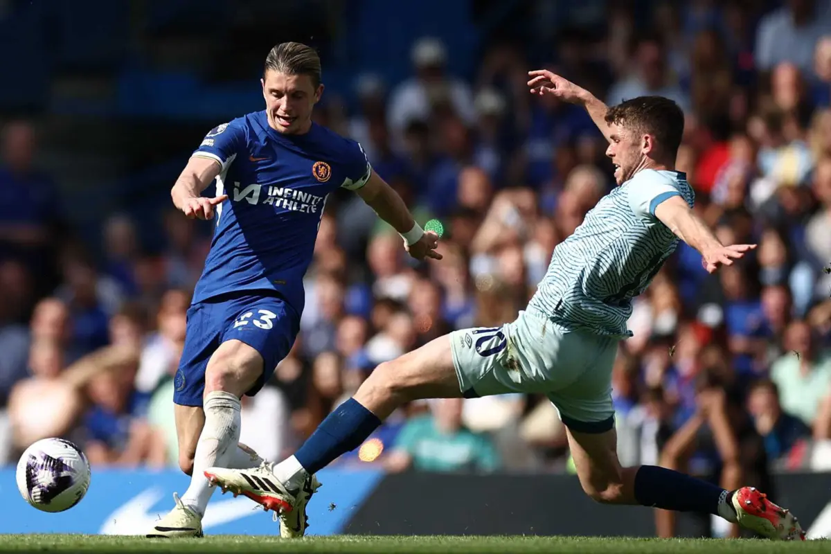 Gallagher, à esquerda (Créditos: AFP)