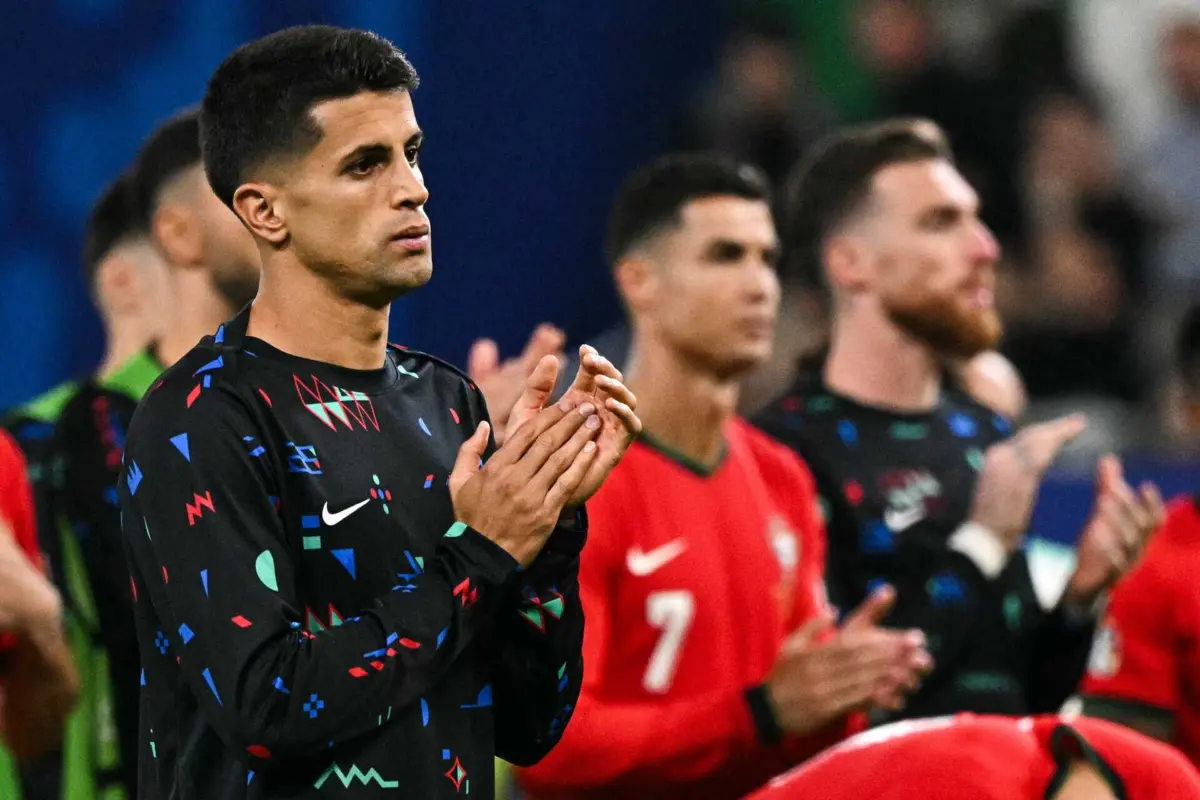 João Cancelo (créditos: AFP)