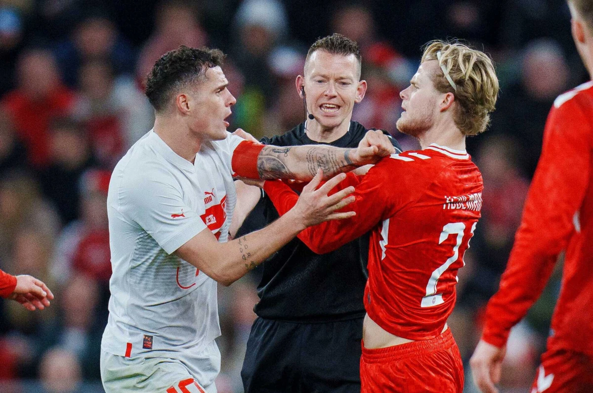 Xhaka e Hjulmand (créditos: AFP)