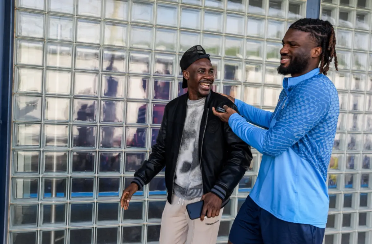 Moffi com o compatriota Zaidu