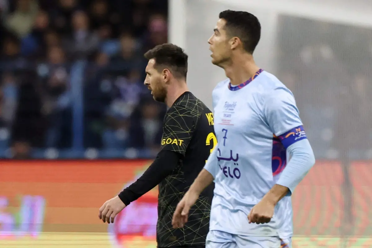 Messi e Cristiano Ronaldo (Créditos: AFP)