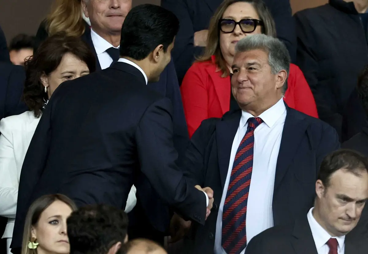 Nasser Al-Khelaifi e Laporta (créditos: AFP)