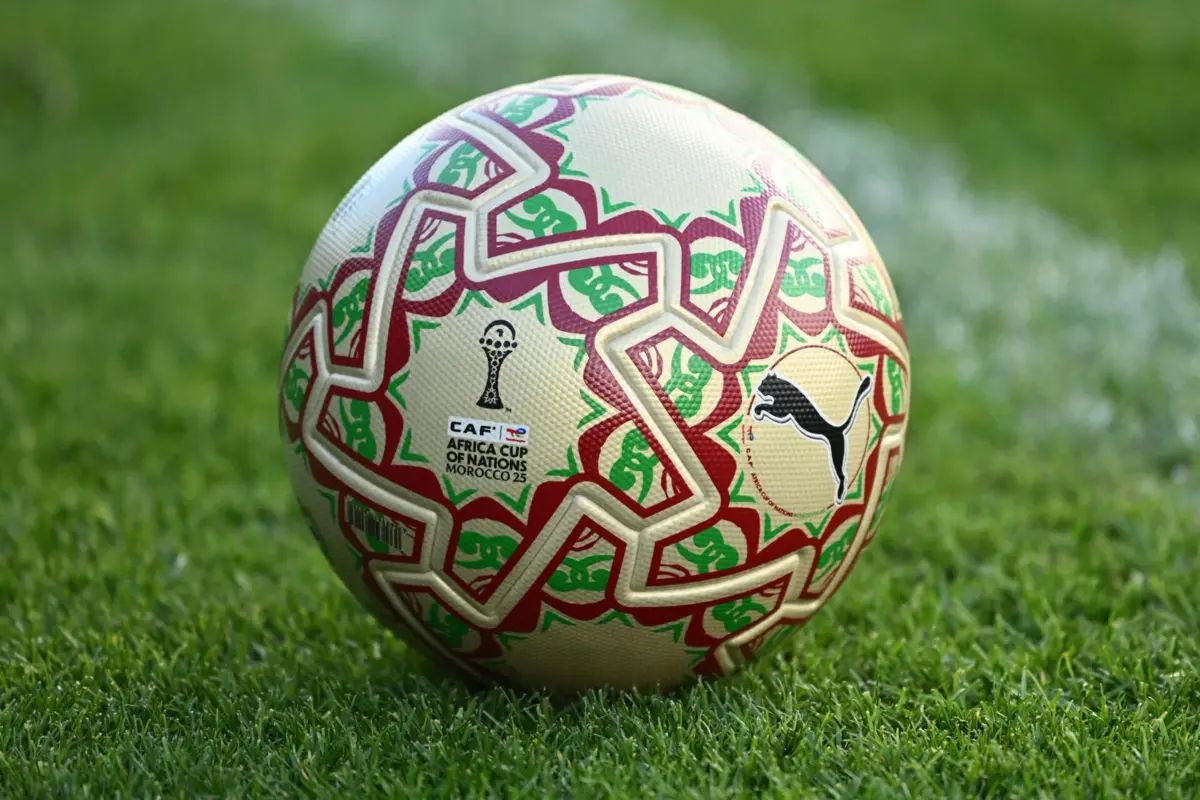 The golden ball, specially made for the final is seen ahead of a training session in Rabat on January 17, 2026, on the eve of the Africa Cup of Nations (CAN) final football match between Senegal and Morocco. (Photo by SEBASTIEN BOZON / AFP)
