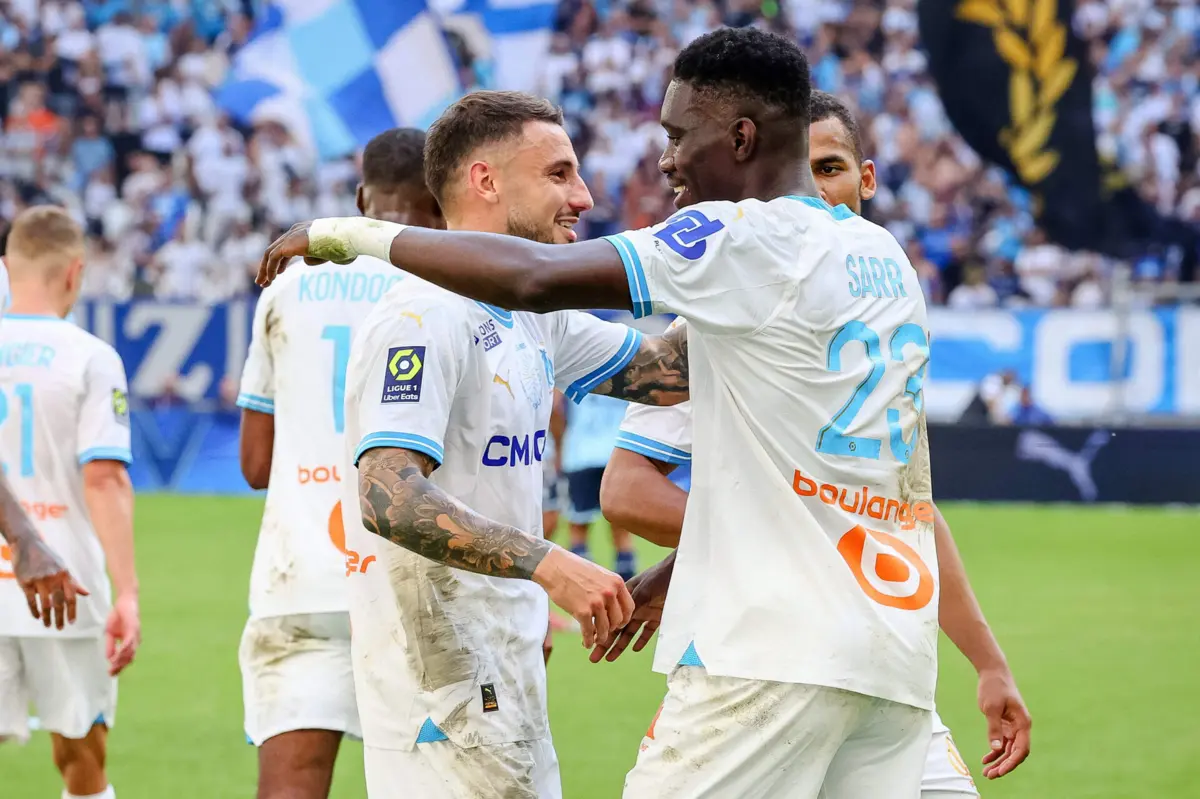 Clauss e Sarr (CLEMENT MAHOUDEAU AFP)