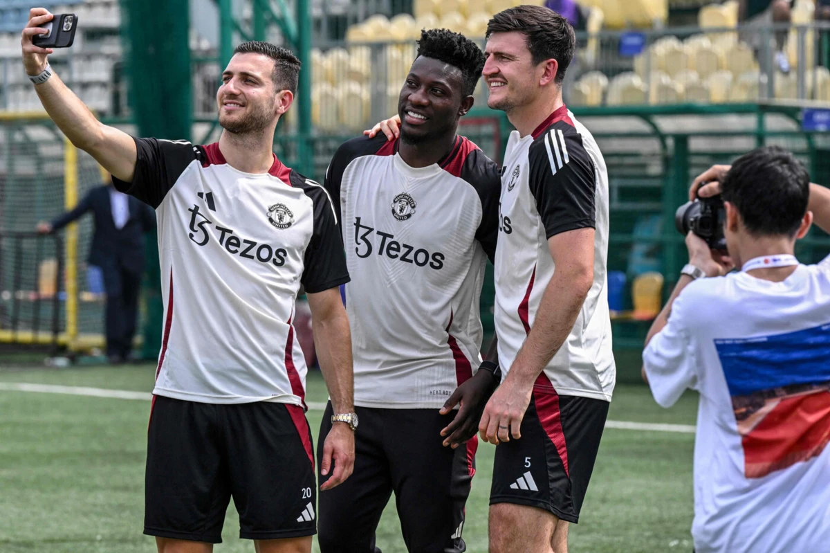 Dalot, Onana e Maguire (Créditos: AFP)