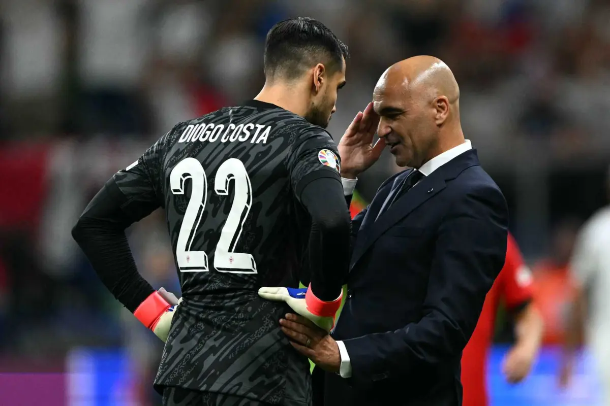 Martínez e Diogo Costa (créditos: AFP)