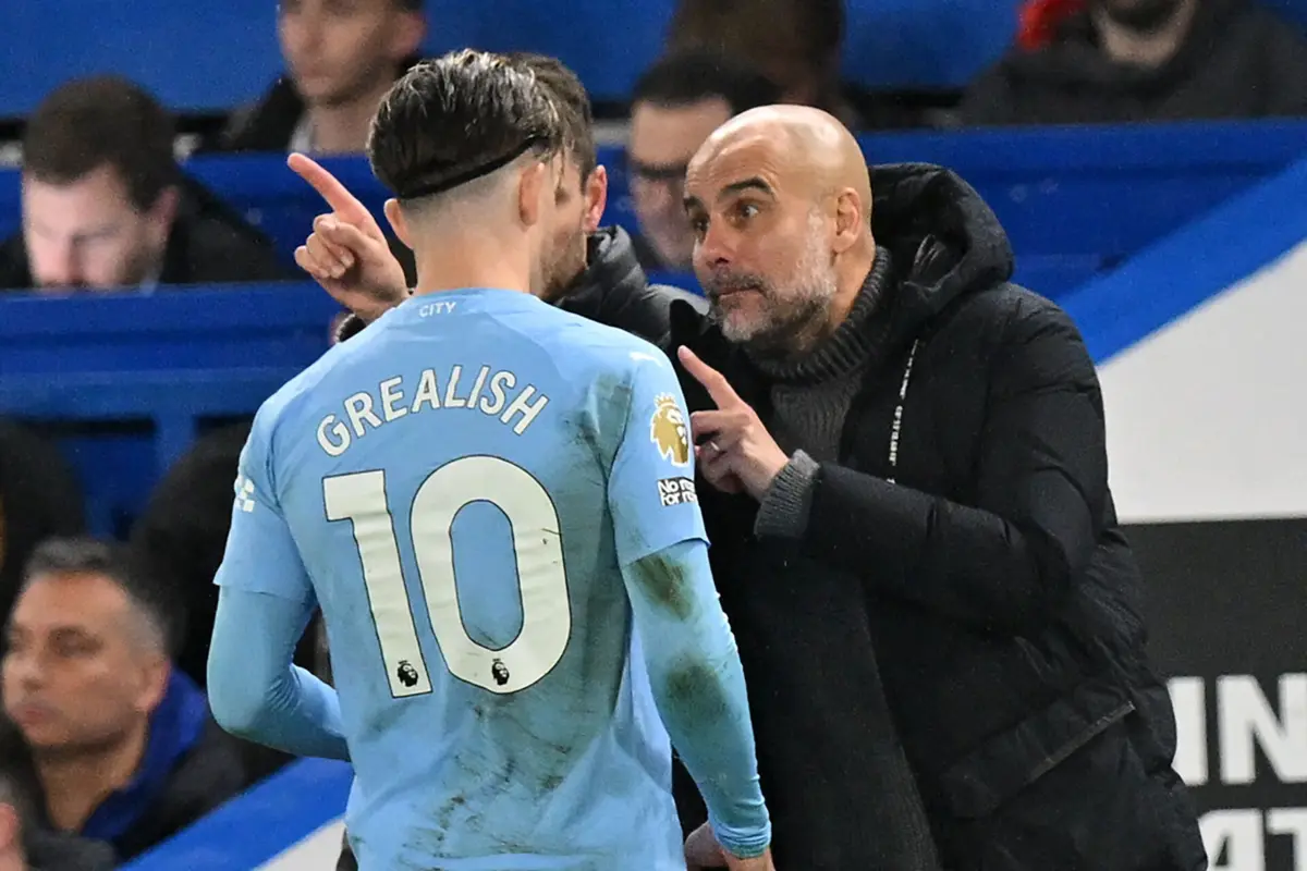Grealish e Guardiola (Créditos: AFP)
