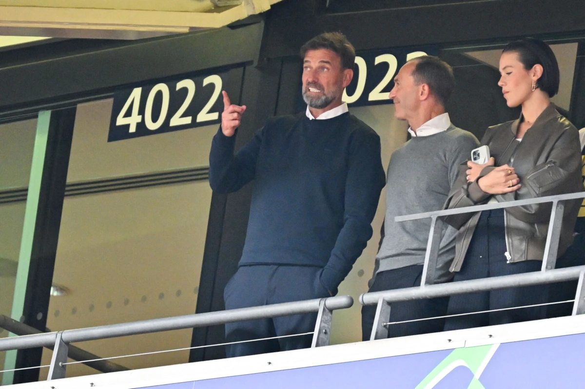 Jurgen Klopp, à esquerda