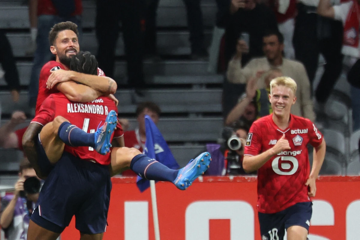 A festa de Giroud (Créditos: AFP)