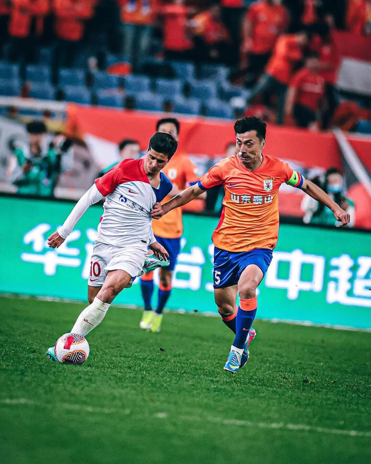 João Carlos Teixeira, à esquerda