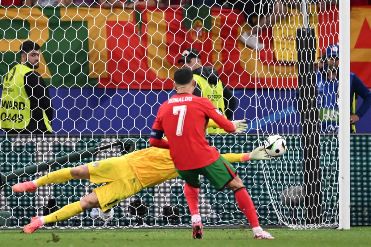 Oblak defende penálti de Ronaldo (créditos: AFP)