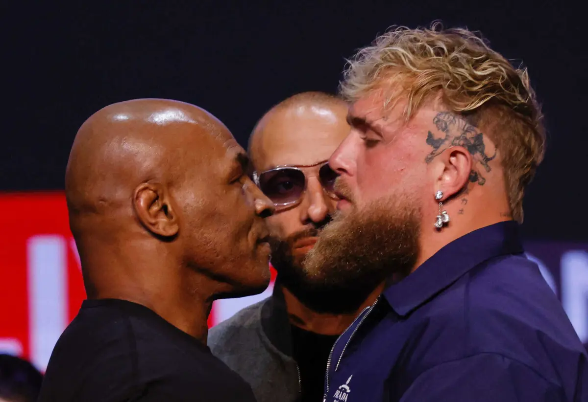 Mike Tyson e Jake Paul (créditos: AFP)