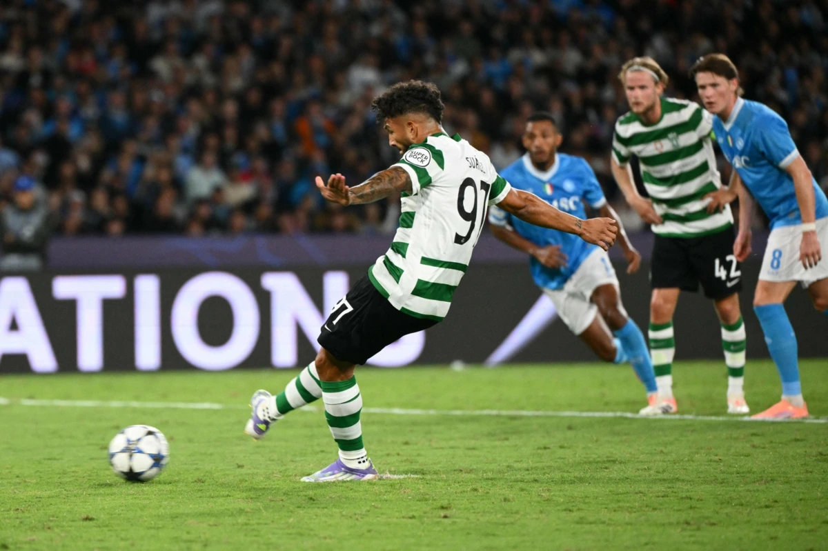 Sporting Lisbon's Colombian forward #97 Luis Suarez kicks and scores a penalty during the UEFA Champions League phase 2 football match Napoli vs Sporting Lisbon at the Diego Armando Maradona stadium in Naples on October 1, 2025. (Photo by Alberto PIZZOLI / AFP)