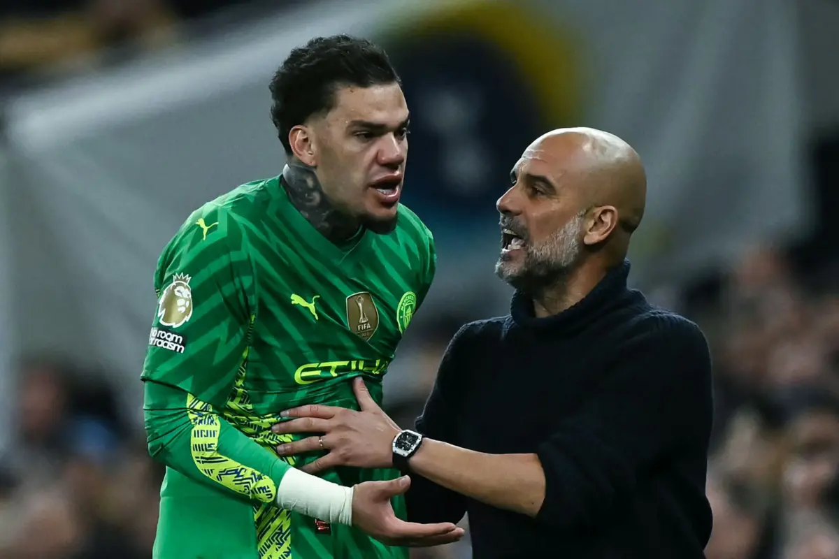 Ederson e Guardiola (Ben Stansall / AFP)