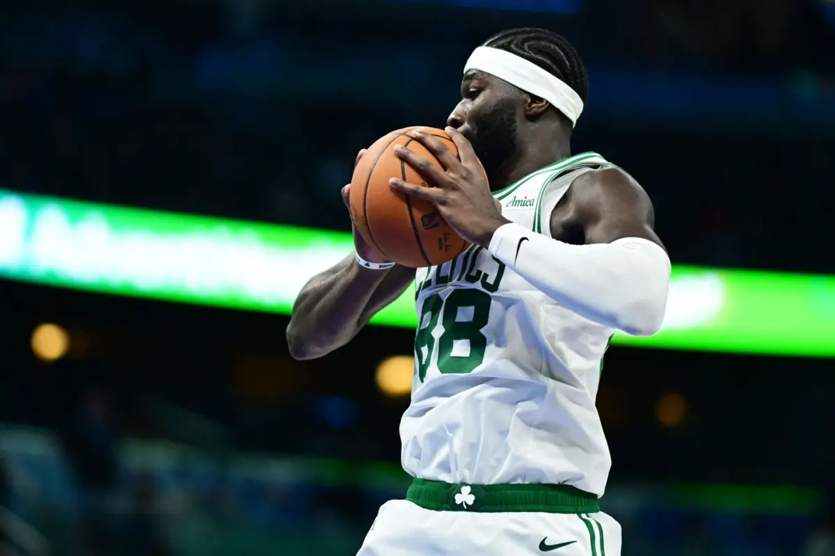 ORLANDO, FLORIDA - NOVEMBER 09: Neemias Queta #88 of the Boston Celtics grabs a defensive rebound in the second half against the Orlando Magic at Kia Center on November 09, 2025 in Orlando, Florida. NOTE TO USER: User expressly acknowledges and agrees that, by downloading and or using this photograph, User is consenting to the terms and conditions of the Getty Images License Agreement. Julio Aguilar/Getty Images/AFP (Photo by Julio Aguilar / GETTY IMAGES NORTH AMERICA / Getty Images via AFP)