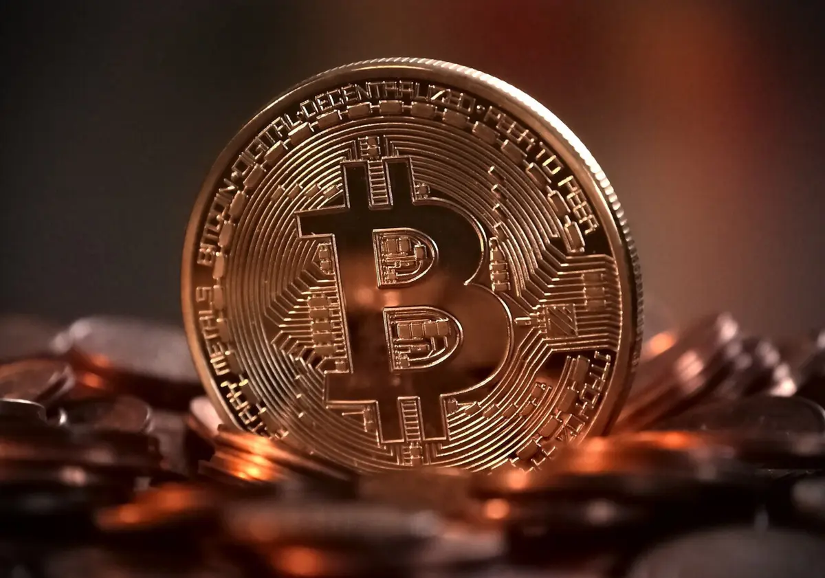 Imagem de contexto do artigo Quase 112 mil dólares: Bitcoin atinge novo máximo histórico