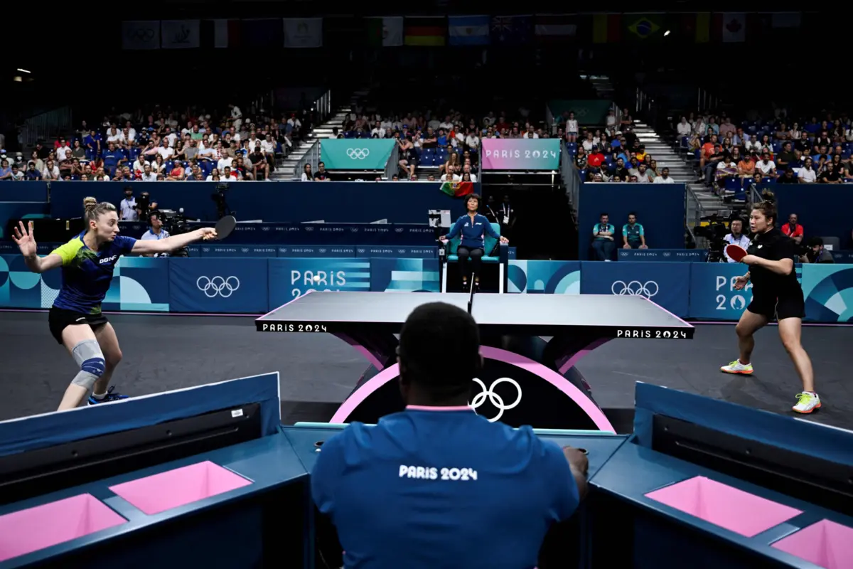 Imagem de contexto do artigo Jogos Olímpicos. Jieni Shao afastada na segunda ronda do ténis de mesa